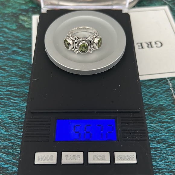 DP DOUG PALUS India Sterling
Silver Genuine Triple Peridot Ring - Picture 8 of 8